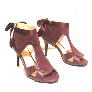 Purple heels with tied bow on the back